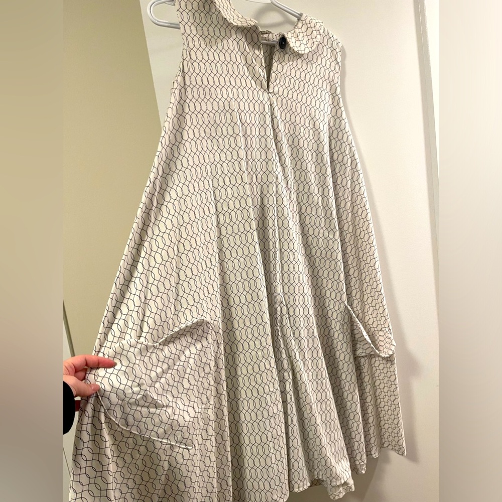 Sleeveless, vintage style ‘cinch- it dress’